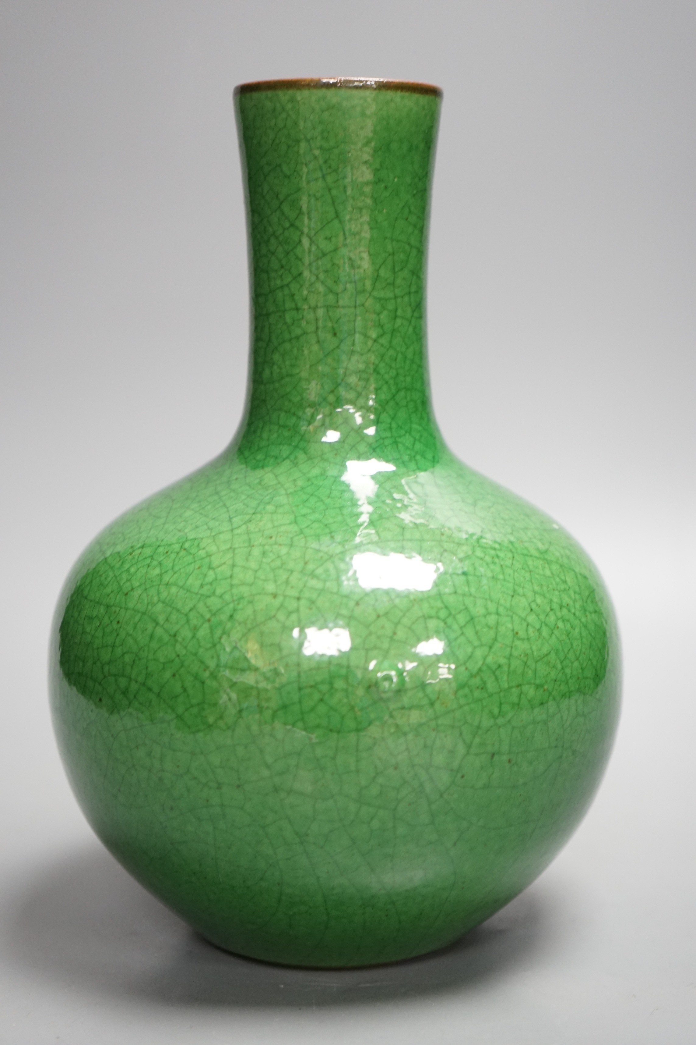 A Chinese green crackleglaze bottle vase, 24cm